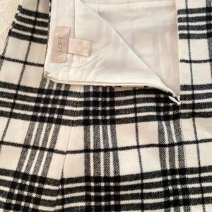 Black and winter white plaid, lined skirt.